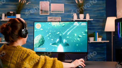 Preview: Over the shoulder woman gamer playing online shooter game