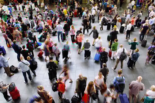Preview: A crowded train station or airport with passengers, commuters and people waiting city transportation