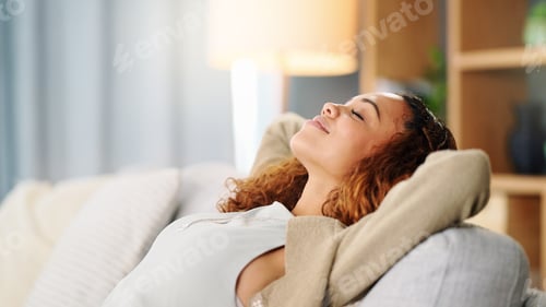 Preview: Woman, relax and hands behind head on sofa, living room and lounge for happiness, calm mind and eas