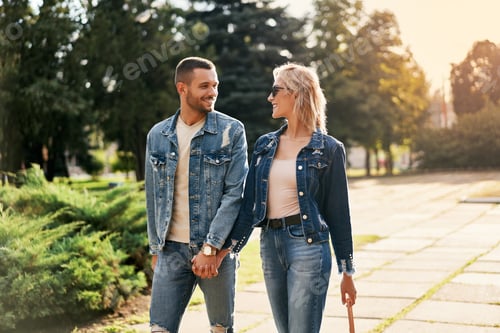 Preview: Young couple in love walking outdoors