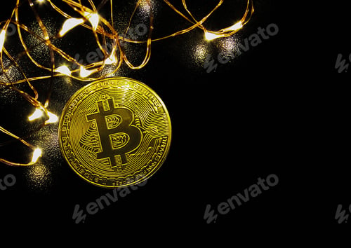 Preview: Golden Bitcoin currency with copy space. Festive atmosphere on black background with lights.