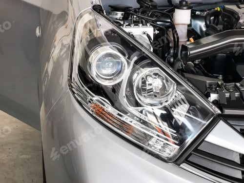 Preview: Selective focus close up image of car head lamp.