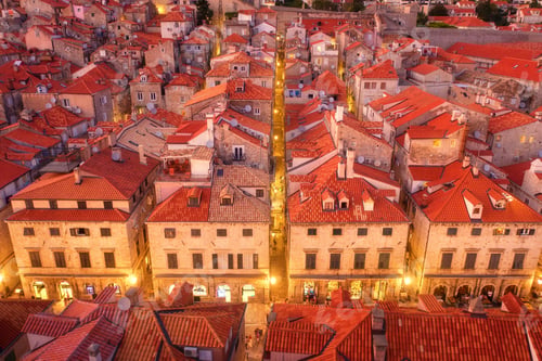Preview: Aerial view of houses with red roofs at night in Dubrovnik