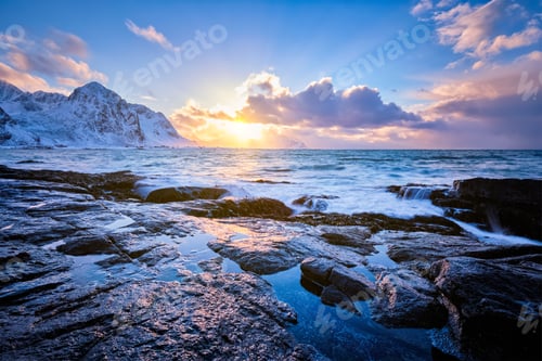 Preview: Coast of Norwegian sea on rocky coast in fjord on sunset