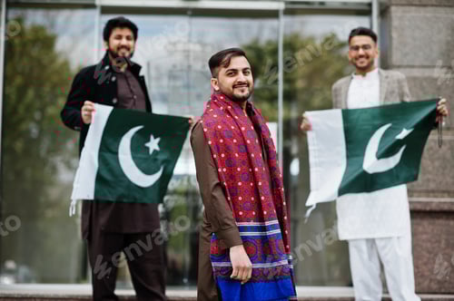 Preview: Group of pakistani man wearing traditional clothes salwar kameez or kurta with Pakistan flags.