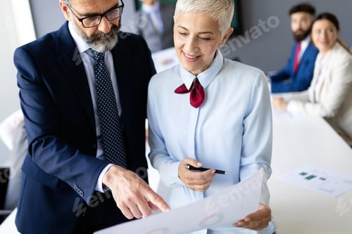 Preview: Business coworkers discussing new ideas and brainstorming in a modern office