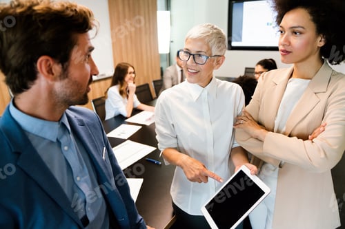 Preview: Collaboration and analysis by business people working in office