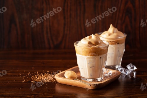 Preview: dalgona coffee in glass. trendy Instant coffee whipped with sugar and hot water