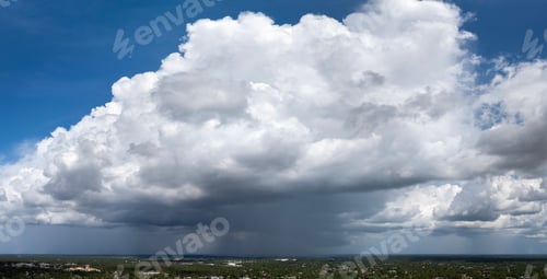 Preview: Stormy cumulus clouds forming during heavy thunderstorm on dark sky