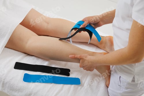 Preview: Kinesio taping of the lower extremities to prolong the massage effect close-up