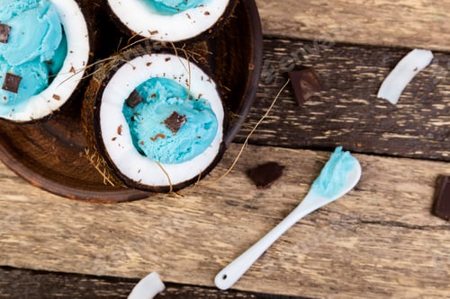 Preview: Blue ice cream in coconut bowl.