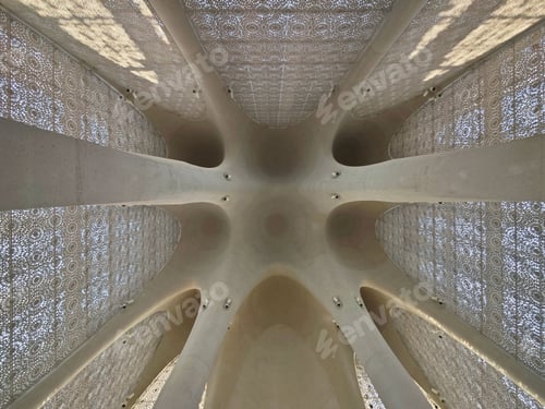 Preview: Detailed view of an intricately designed architectural ceiling with patterned perforations