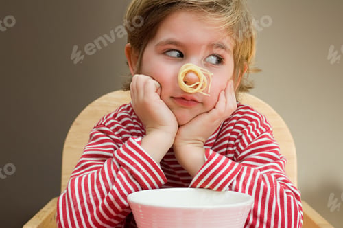 Preview: Boy with spaghetti on his nose