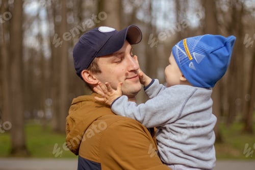 Preview: Baby boy touching father’s face