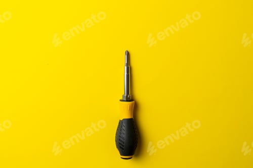 Preview: a black and yellow screwdriver isolated, repair tool equipment