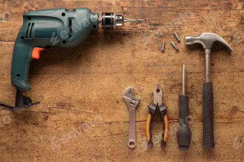 Preview: Tools on a Wood Surface, Drill and Hammer