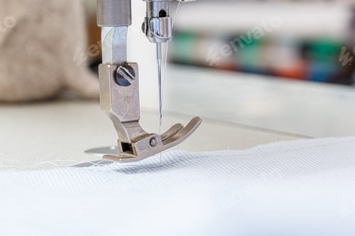 Preview: Sewing machine needle with thread and fabric