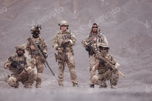 Preview: Soldiers in camouflage military uniforms carrying weapons Reconnaissance missions in rugged mountain