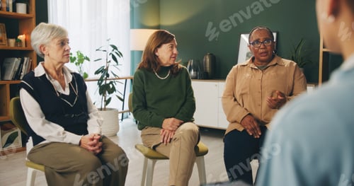 Preview: Group therapy, senior women and circle in discussion with psychologist for mental health in retirem