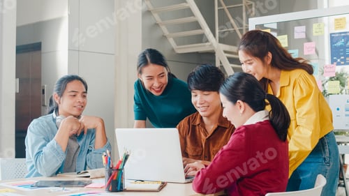Preview: Multiracial group of young creative people discussing business brainstorming meeting ideas