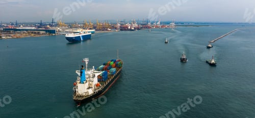 Preview: Container ship carrying container box in import export to commercial port, Global business cargo.