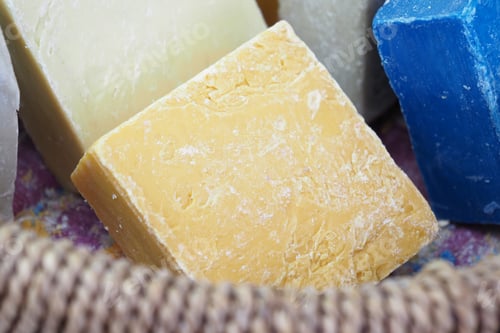 Preview: Homemade natural soap bar on black background