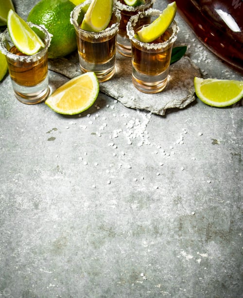 Preview: Tequila with salt and lime slices.