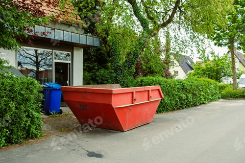 Preview: Large street garbage container. Metal red container for construction waste.