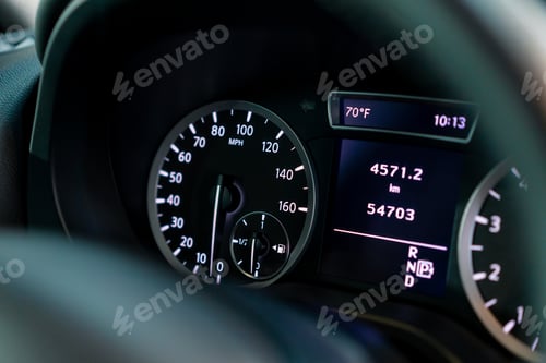 Preview: Close-up of the odometer and dashboard of a luxury car with a black interior after detailing