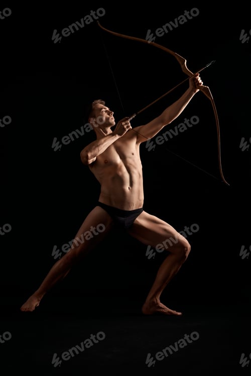 Preview: Athletic archer shooting with bow