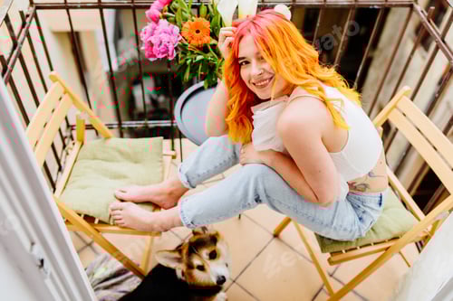 Preview: Top view portrait of young woman with pink hair