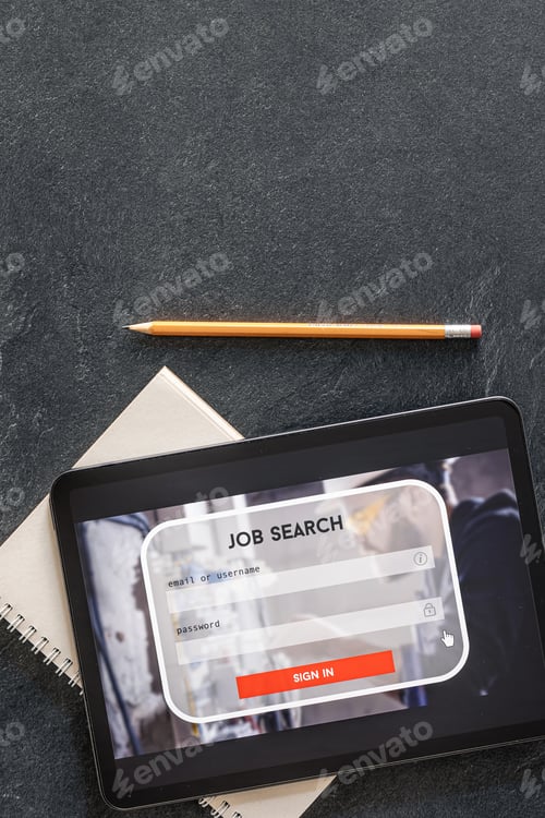 Preview: Top view of digital tablet with search job on screen.