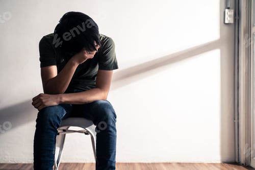 Preview: Asian male unemployed worker sit on chair feeling stress that have no job due to crisis.