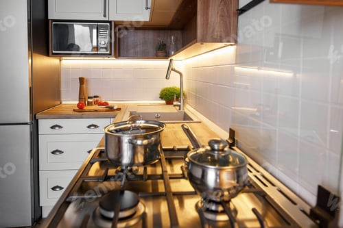 Preview: Kitchen interior with modern furniture and stainless steel appliances