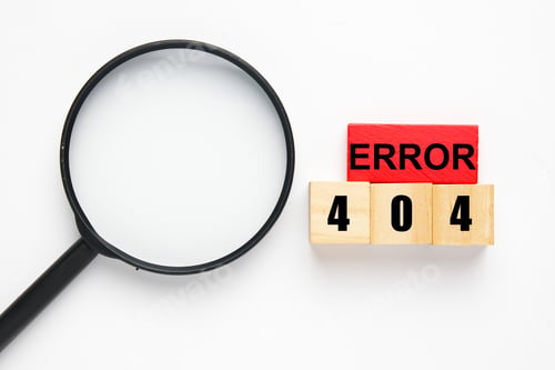 Preview: Magnifying glass, wooden block red and brown with the word Error 404. Try and error concept