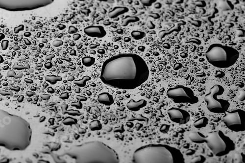 Preview: Water droplets on a surface during early morning hours creating interesting patterns