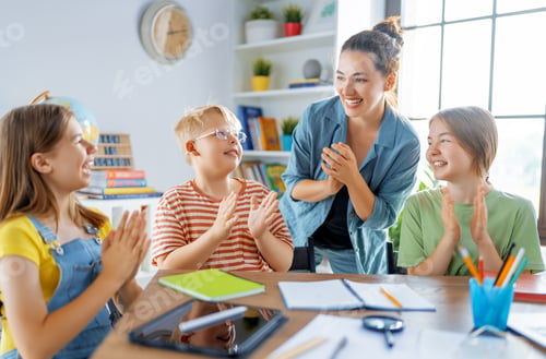 Preview: Happy kids and teacher at school