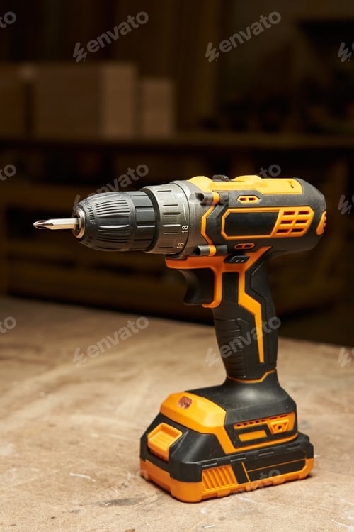 Preview: Cordless Power Drill on Wooden Surface