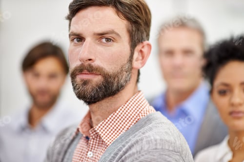 Preview: Confident in his team-leading abilities. Portrait of a group of young office professionals.