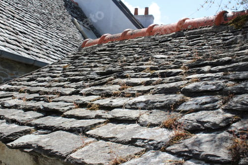 Preview: Close shot of a rock slate roof at daytime