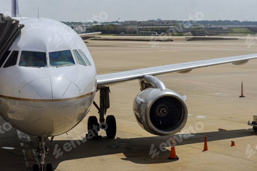 Preview: Front view of landed airplane in a terminal of at the John F. Kennedy International Airport