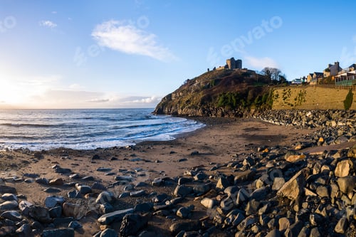Preview: Criccieth Castle, above Criccieth Beach at sunrise, North Wales