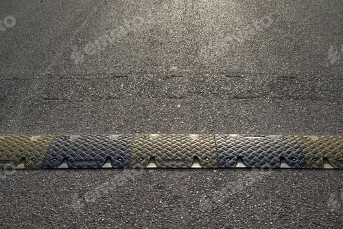 Preview: Background Texture Of The Asphalted Road Or The Highway And A Hump Closeup For Reduction In The