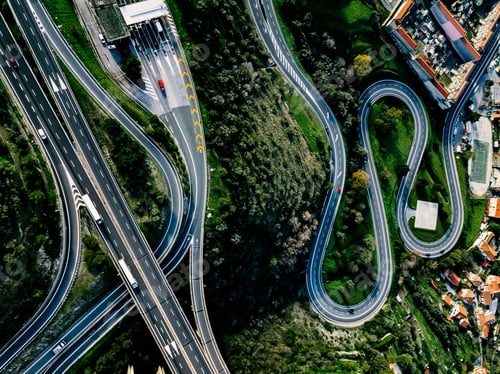 Preview: Aerial view of highway, expressway and motorway with a toll payment point in Italy