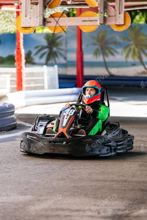 Preview: Man racing go kart on outdoor track