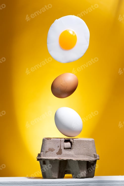 Preview: Raw egg gradually turning into a fried egg on yellow background