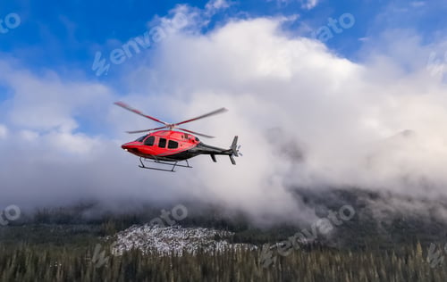 Preview: Red Helicopter in Mountain Skies Above Cloudy BC Landscape Aerial Photo