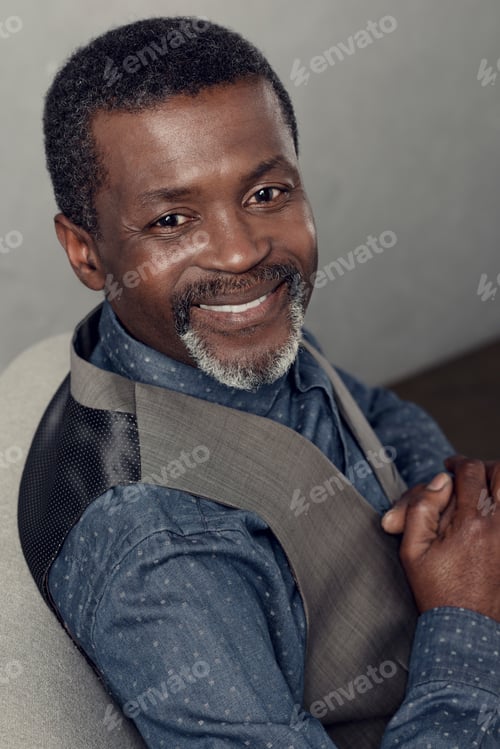 Preview: portrait of handsome smiling african american man in waistcoat