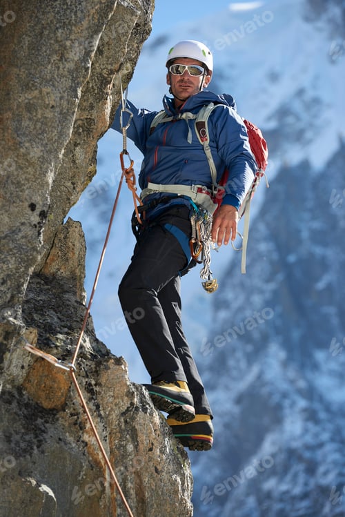 Preview: Mountaineer using harness for climb, Chamonix, Rhone-Alps, France