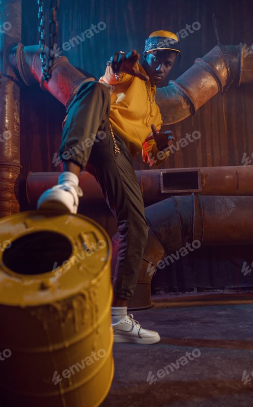 Preview: Young rapper in yellow hoodie poses in studio